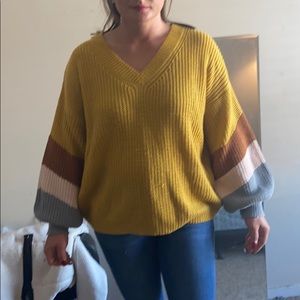 Mustard sweater with stripes sleeves